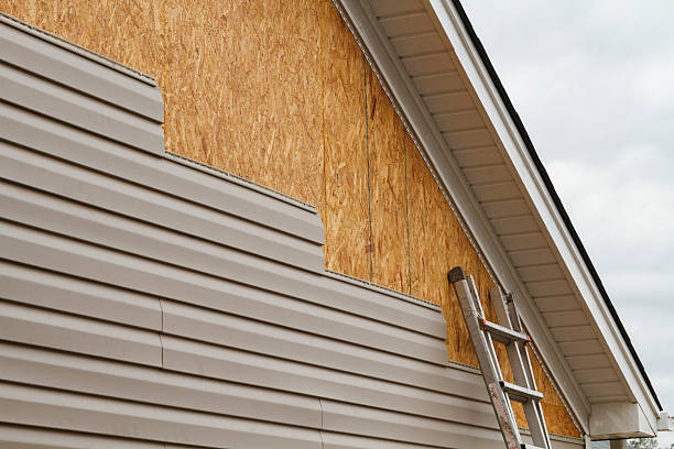 Professional Vinyl Siding technician working in Smithfield, NC